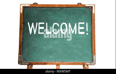 Welcome! text message in white chalk written on a school green old grungy vintage wooden chalkboard or blackboard with frame and stand isolated on whi Stock Photo