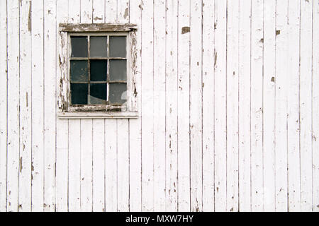 An old milk barn in northern Illinois. Since the dairy farm shut donw the buildings have been vacant. Stock Photo