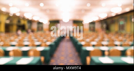 Blurred, defocused background of modern conference room or university lecture hall. Company business meeting, convention center, education concept Stock Photo