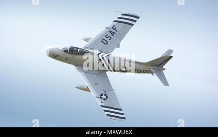 North American F 86A Sabre swept wing jet fighter airplane in flight during the Biggin Hill Air Show at the famous wartime airfield in Kent, England. 2008 Stock Photo