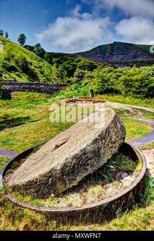 The crushing wheel of Odin Mine was used to crush the ore from the nearby lead mine until the 19th century - location: Castleton, Peak District Stock Photo