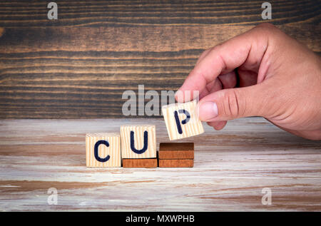 cup. Sports competitions, success at work or achievements in training Stock Photo