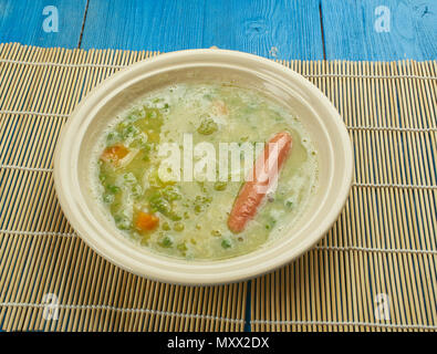 Erbsensuppe - German  Pea Soup and sausage or Kassler Stock Photo