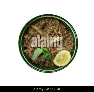 Pakistani cuisine ,Mutton Taka Tak Lahori Style,  mutton brain, sweet bread and kidney in assorted spices, served with mint chutneyTraditional assorte Stock Photo