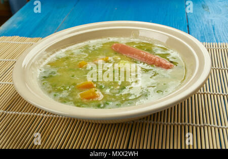 Erbsensuppe - German  Pea Soup and sausage or Kassler Stock Photo