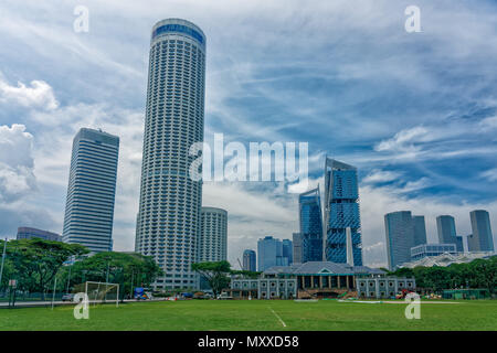 View of Downtown Singapore with Swiss Hotel The Stamford from Padang Stock Photo