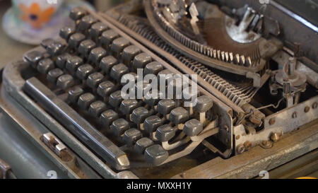 Old, vintage typewriter in the antiquarian store. Stock Photo