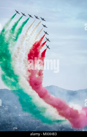 The Italian Aerobatic Display Team the Frecce Tricolori formation flying over the Lake Maggiore, Verbania, Italy Stock Photo