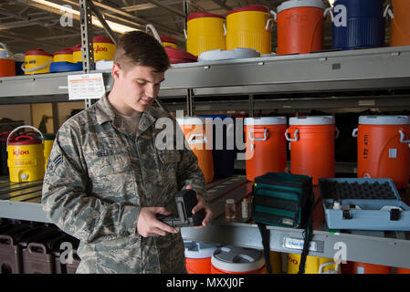 Senior Airman Alexander Delfs, 436th Aerospace Medicine Squadron bioenvironmental engineering journeyman, conducts a pH test on a water sample Nov. 16, 2016, at an aircraft watering point on Dover Air Force Base, Del. All potable water used by aircrews comes through an aircraft watering point. (U.S. Air Force photo by Senior Airman Aaron J. Jenne) Stock Photo