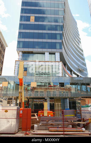 Winnipeg, Manitoba / Canada - June 3, 2018: Modern building behind a construction Stock Photo