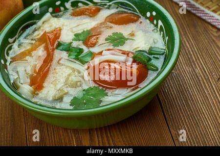 shorba Fish ogurdzhalinskaya,  Turkmen cuisine , Traditional assorted dishes, Top view. Stock Photo