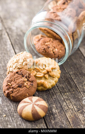 Different types of sweet cookies in jar. Stock Photo