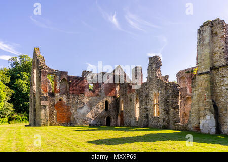 The ruins of Netley Abbey monastery near Southampton against blue sky in May 2018 -  the ruins are an English heritage site in Hampshire, England, UK Stock Photo