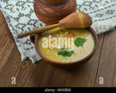 German Split Pea Soup,  ham hock, beef broth, split peas, and carrots. Stock Photo