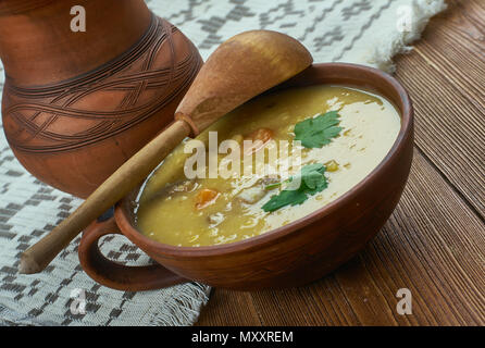 German Split Pea Soup,  ham hock, beef broth, split peas, and carrots. Stock Photo