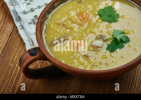 German Split Pea Soup,  ham hock, beef broth, split peas, and carrots. Stock Photo