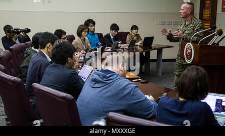 Lt. Gen. Lawrence D. Nicholson addresses Japanese reporters on Marine Corps Base Camp Foster, Okinawa, Japan, Dec. 14, 2016. An MV-22B Osprey landed in shallow waters off the Okinawa coastline of Camp Schwab on Dec. 13, 2016. All five crewmembers were airlifted via HH-60G to the United States Naval Hospital aboard Camp Foster where they are being treated for injuries. The MV-22B Osprey is with Marine Aircraft Group 36, 1st Marine Aircraft Wing, III Marine Expeditionary Force. The HH-60G is with the US Air Force's 33rd Rescue Squadron, 18th Operations Group, 18th Wing. Nicholson, from Toronto,  Stock Photo