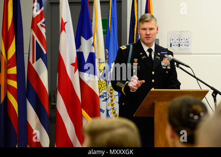 U.S. Army Col. Lance Varney, Commander of the U.S. Army Garrison (USAG) Bavaria , thanks individuals for their time in service at the USAG Quarterly Military Retirement Ceremony, in Vilseck, Germany, Dec. 9, 2016. (U.S. Army photo by Spc. Emily Houdershieldt) Stock Photo