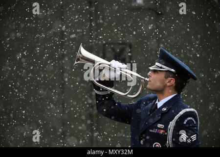 WESTHAMPTON BEACH, NY - Senior Airman Avery Friedman, a member of the 106th Rescue Wing Honor Guard, performs 'Taps' during a moment of training at F.S. Gabreski Air National Guard Base, Westhampton Beach, NY on December 15, 2016. (U.S. Air National Guard / Staff Sgt. Christopher S. Muncy) Stock Photo