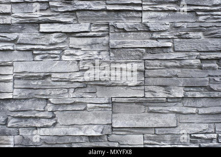 tiled natural stone wall background - granite stone texture Stock Photo