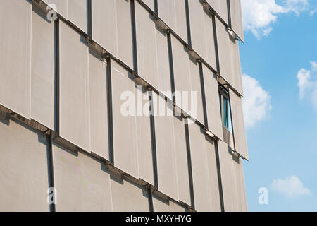closed sunblinds on modern building facade - office building Stock Photo