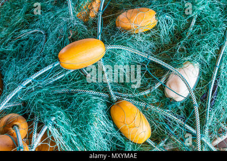 Green fishnet material with plastic floats attached in the Britannia Boat Yard in Steveston, Canada Stock Photo