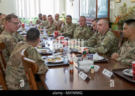 Brig. Gen. Richard Sele, the deputy commanding general of U.S. Army Civil Affairs & Psychological Operations Command (Airborne) from Fort Bragg, N.C., attends a luncheon with civil affairs Soldiers at Camp Arifjan, Kuwait on Dec. 16, 2016. Sele's also visit included meetings with U.S. Army Central senior leaders including Maj. Gen. William Hickman, U.S. Army Central deputy commanding general - operations. (U.S. Army photo by Sgt. Angela Lorden) Stock Photo