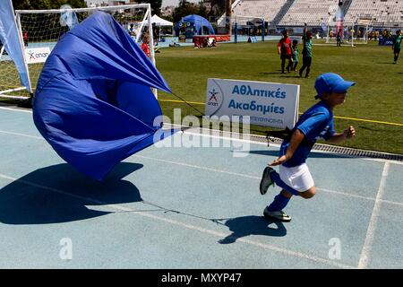 boy and parachute at the ground Stock Photo