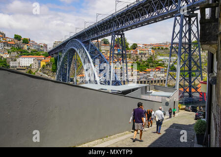 Street view of Dom Luís I Bridge in Porto, Portugal. Stock Photo