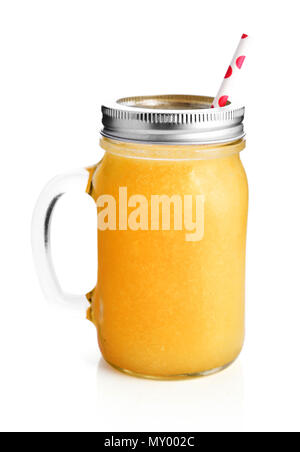 Healthy yellow smoothie with straw in a jar mug isolated on white Stock Photo