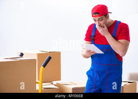 Contractor worker moving boxes during office move Stock Photo