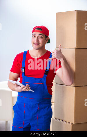 Contractor worker moving boxes during office move Stock Photo