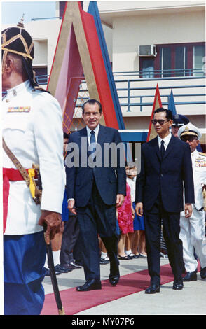 King Bhumibol Adulyadej of Thailand walks red carpet with President Richard Nixon Stock Photo