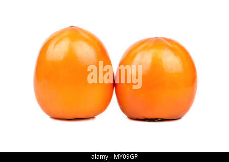 Two ripe persimmon fruits on a white background Stock Photo