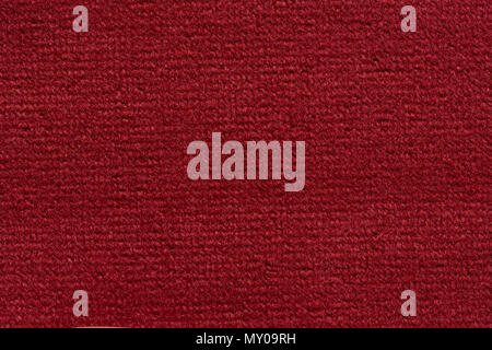 Marvelous textile background in deep red tone. Stock Photo