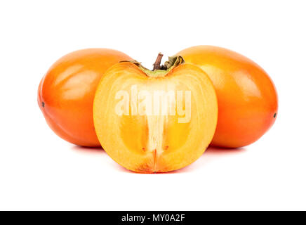 Two fruits persimmons with half on white background Stock Photo