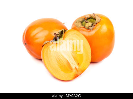 Two fruits persimmons with half on white background Stock Photo