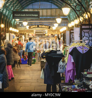 London, UK - October 2017. People shopping at the Apple market in Covent Garden. Square format. Stock Photo