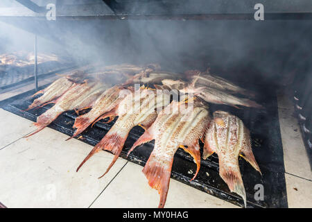 Fresh caught fish being prepared at a private restaurant in Nueva Gerona on Isla de la Juventud, Cuba Stock Photo