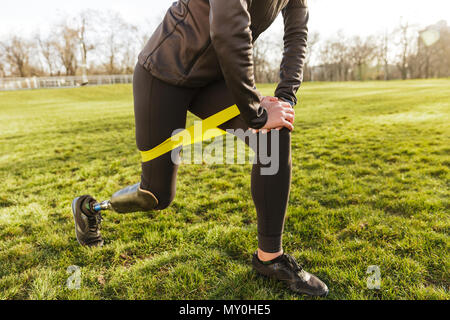 Exercises With Sunrise. Side View Of Beautiful Disabled Athlete Woman In  Sportswear With Prosthetic Leg Standing In Yoga Pose At The Beach. Stock  Photo, Picture and Royalty Free Image. Image 124837781.