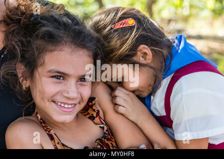 Young school girls in the community of Pepito Tey, Cuba Stock Photo