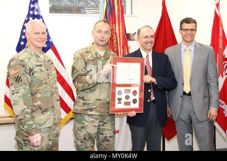 Scott Croxton Col. Christopher Barron and Scott Acone stand with Brig. Gen. William ...