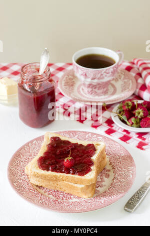 Delicious Toasts Served With Jam And Tea On Wooden Table Stock Photo 