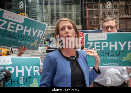 New York, USA. 5th June, 2018. Standing on Fifth avenue by Trump Tower Democratic NYS Zephyr Teachout joins supporters on Tuesday, June 5, 2018 as she announces that she is joining the field and running for New York State Attorney General, replacing disgraced Eric Schneiderman who resigned. Teachout made the announcement on the first day of petitioning, which she has to do to get on the ballot having not received 25% of the delegates' votes at the recent Democratic State Convention. (Â© Richard B. Levine) Credit: Richard Levine/Alamy Live News Stock Photo
