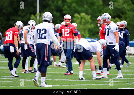 Foxborough, Massachusetts, USA. 5th June, 2018. New England Patriots quarterback Tom Brady (12) warms up at the team's mini camp held on the practice fields at Gillette Stadium, in Foxborough, Massachusetts. Eric Canha/CSM/Alamy Live News Stock Photo