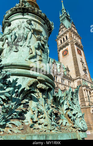 Ornate column and Rathaus City Hall Hamburg Germany Stock Photo