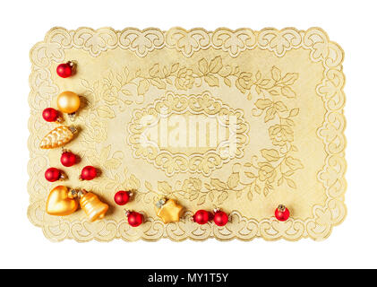 Christmas decoration with vintage plastic placemat, red and gold baubles isolated on white background clipping path included. Design element, flat lay Stock Photo