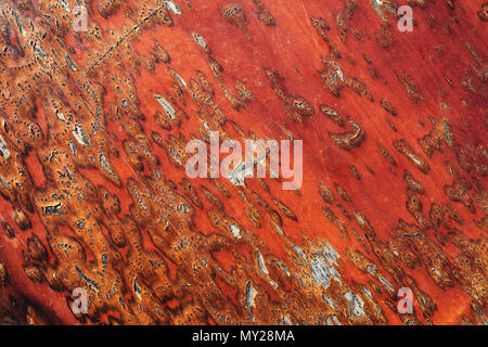 Textured stripped red orange colored wooden grunge background. Stock Photo