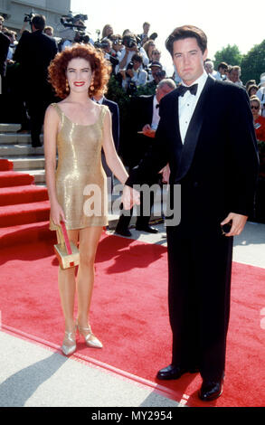 PASADENA, CA - AUGUST 25: (L-R) Actress Lara Flynn Boyle and actor Kyle MacLachlan attends the 43rd Annual Primetime Emmy Awards on August 25, 1991 at Pasadena Civic Auditorium in Pasadena, California. Photo by Barry King/Alamy Stock Photo Stock Photo