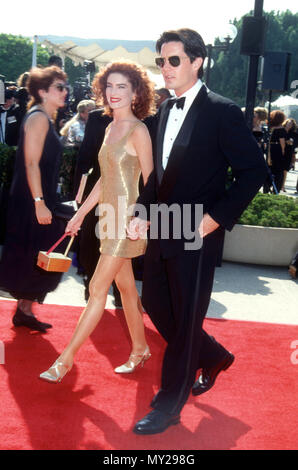 PASADENA, CA - AUGUST 25: (L-R) Actress Lara Flynn Boyle and actor Kyle MacLachlan attends the 43rd Annual Primetime Emmy Awards on August 25, 1991 at Pasadena Civic Auditorium in Pasadena, California. Photo by Barry King/Alamy Stock Photo Stock Photo